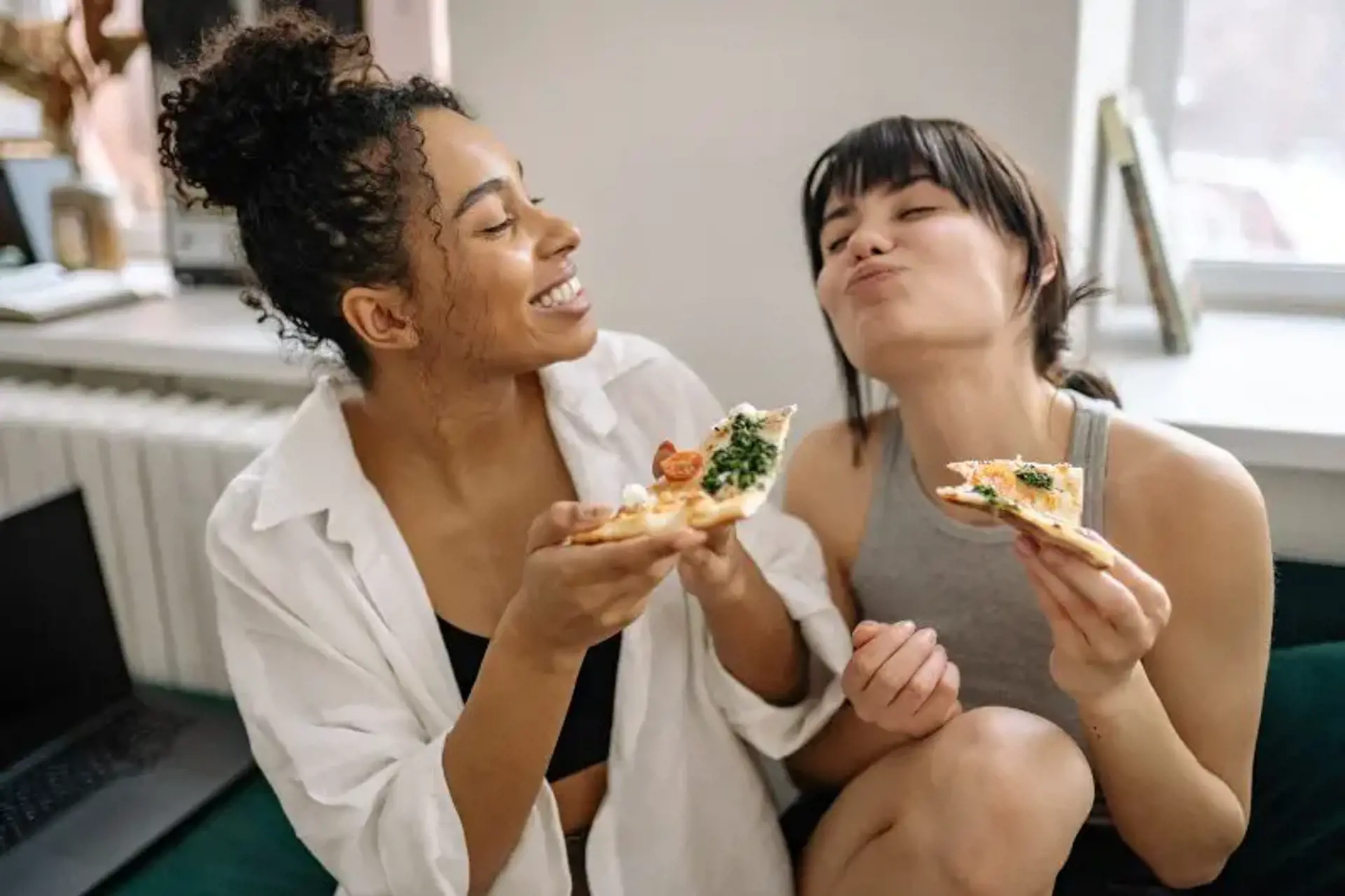 Girls Eating Pizza With Temporary Crown